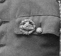 Photographie d'Émile DUPOISOT fils, détail de son enseigne